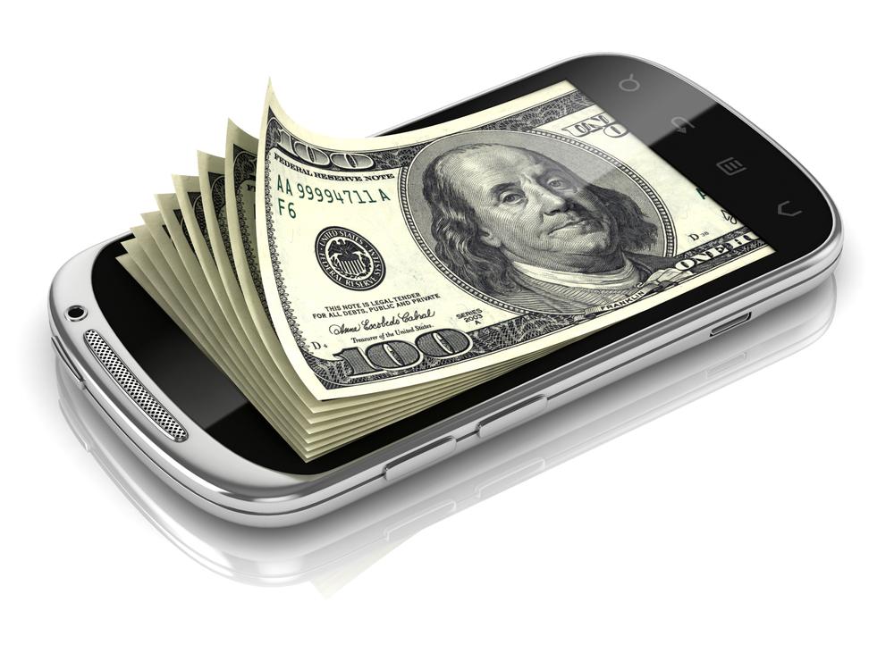 Smartphone, dass ein Bndel voller Geldscheine an der Stelle eines Displays hat